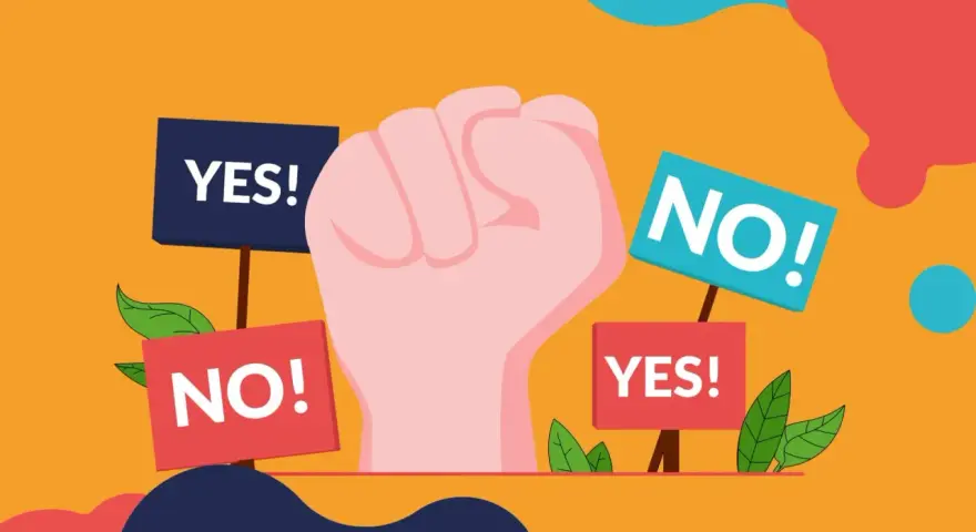 Pugno chiuso con cartelli "YES!" e "NO!". Un'immagine che simboleggia la scelta, il dibattito, il "woke washing" che cerca di influenzare le decisioni.