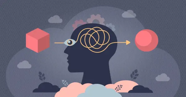 Un cubo rosso si trasforma in una sfera attraverso un percorso mentale aggrovigliato, illustrando l'effetto priming.